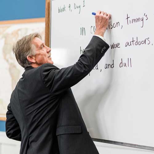 Andrew Pudewa instructing on white board